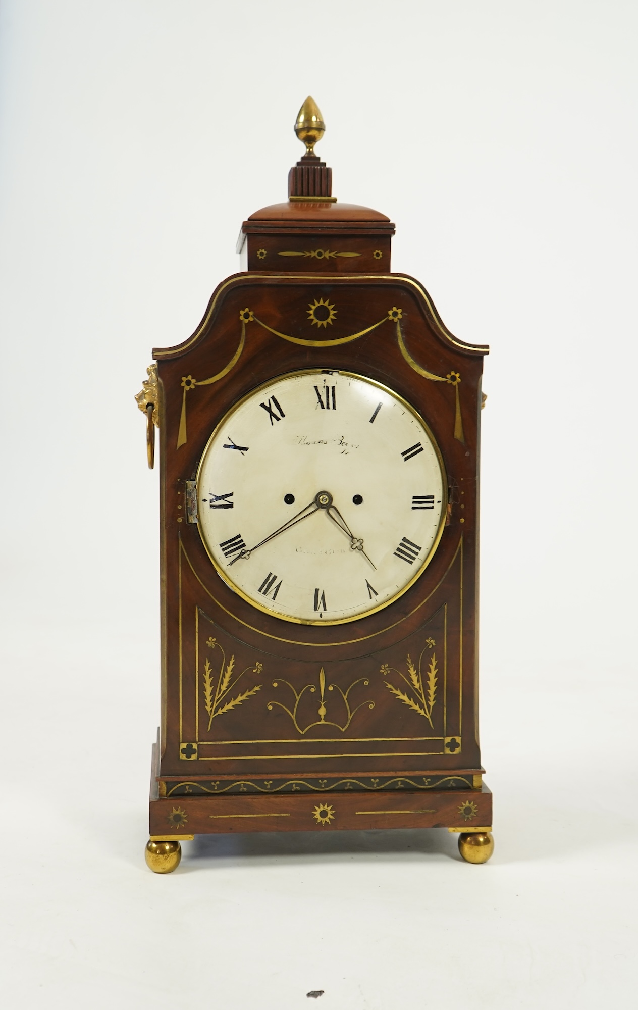 A Regency mahogany and cut brass inlaid bracket clock